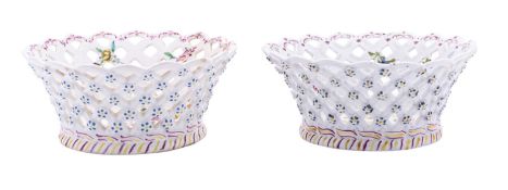 A pair of Bow porcelain baskets, circa 1765 of flared circular form,