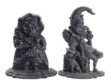 A pair of cast iron door porters modelled as Mr Punch and Judy,