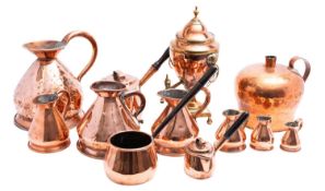 A collection of 19th century domestic copperware; including seven graduated haystack measures,
