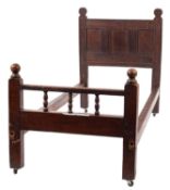 A 17th century and later oak single bed with triple moulded and fielded panel headboard and