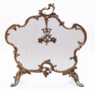 A gilt metal and mesh spark guard in Louis XV taste,