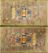 A pair of contemporary Chinese rugs, the central oblong panels with stellar and triangular designs,