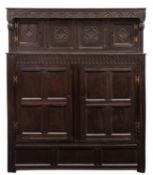 A 17th Century oak court cupboard, rectangular top with lunette carved frieze,
