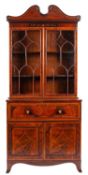 An early 19th Century mahogany and inlaid secretaire bookcase,