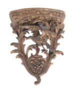 A carved giltwood and composition wall bracket in 18th century taste,