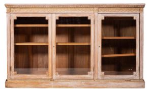 A late 19th / early 20th Century French country sideboard, the rectangular top with moulded edge,