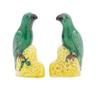 A pair of Chinese miniature figures of green parrots,