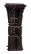 A large Chinese archaistic bronze vase, 19th/20th century of Gu form,