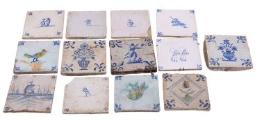 A collection of Dutch polychrome and blue and white delftware tiles,