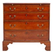 A George III mahogany rectangular chest, of small size with a moulded top,