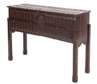 An early 18th Century oak rectangular coffer, the hinged top with a moulded edge,