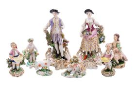 A mixed lot of eight English porcelain figures,