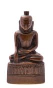 A Burmese bronze Buddha, 18th/19th century seated in meditation, 22cm.