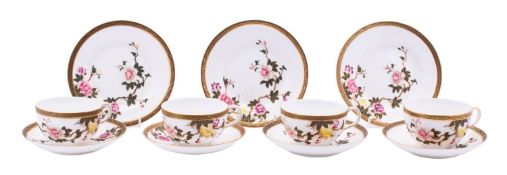 A Royal Worcester porcelain part tea service, decorated with flowering peony, comprising eight cups,