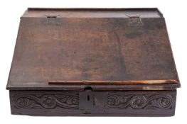 An oak Bible box, late 17th century; with hinged sloping cover,