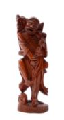 A Chinese carved hardwood figure of the Immortal Li Tieguai,
