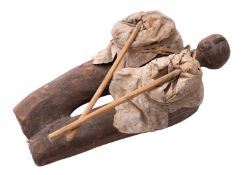 An African tribal carved wood and linen fetish figure, 40cm; and two carved wood standing figures,