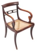 A Regency beechwood simulated rosewood elbow chair,