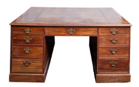 A mahogany and inlaid leather partners desk in George III style,