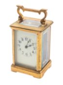 A French brass cased Obis carriage clock the eight-day duration timepiece movement having a