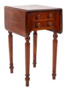 A Victorian mahogany drop flap work table, the hinged top with rounded corners and a moulded edge,