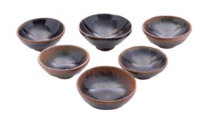 A group of six small Chinese 'hare's fur' bowls in Song dynasty style,