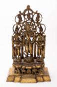 A Sino-Tibetan gilt-bronze group, 20th century in the form of three deities,