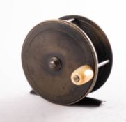 A Charles Farlow 3 /14 inch brass four bar reel,