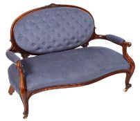 A Victorian carved rosewood settee,