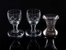 Three Masonic firing glasses,