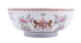 A French famille rose armorial bowl in Chinese Export style,