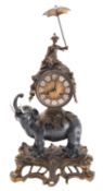 A late 20th century Elephant mantel clock having an eight-day duration movement with lever