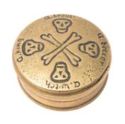 A George III circular brass snuff box,