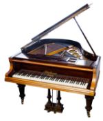 A Bluthner rosewood cased baby grand piano on turned and fluted legs, frame no.