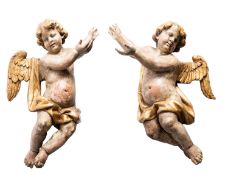 A pair of substantial and impressive Continental carved, polychrome and parcel giltwood models