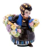 A Lenci pottery figure 'Flower Girl' modelled after the original by Sandro Vachetti, painted Lenci,