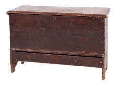 A George II pine and oak rectangular coffer, with a hinged moulded top,