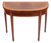 A George III mahogany and inlaid card table, of D-shaped outline,