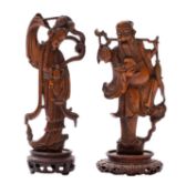 A mixed lot of Chinese soapstone and carved hardwood works of art,