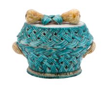 A Holitsch faience 'trompe l'oeil' tureen and cover of oval basket form,