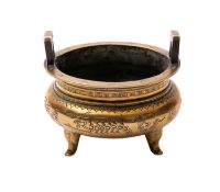 A Chinese polished bronze tripod censer, 19th/20th century with angled upright handles,