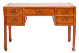A Chinese hardwood rectangular kneehole desk or dressing table, containing five short drawers,