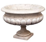 A Carrara veined white marble urn in Regency style,