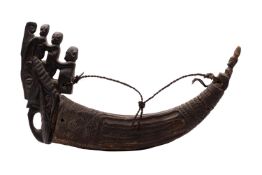 A Batak ebonised wood and buffalo horn magic horn, Sumatra,