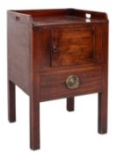 A George III mahogany and inlaid tray top commode, bordered with ebonised lines,