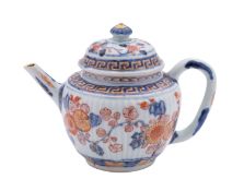 A Chinese Imari teapot and cover, Kangxi/early Qianlong of reeded form,