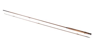A Hardy 'Illingworth' greenheart 8'6'' two piece Trout Spinning rod, numbered 'A20367' to mount,