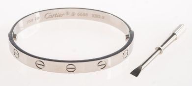 Cartier, An 18ct white gold classic love bracelet bangle, with the classic screw design,