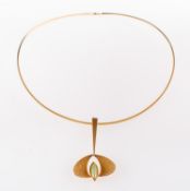 A 1970's modernist pendant and wire necklet, the pendant of modernist design,
