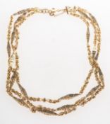 A three row fancy link chain necklace,
